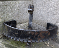  cast iron scraper in corner