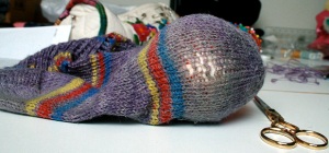 sock with darning ball inside
